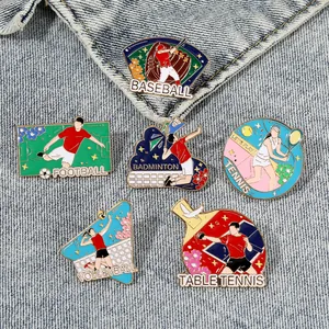 Set of 6 sports themed enamel pins featuring soccer baseball and tennis on denim fabric