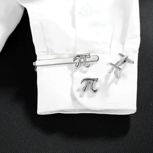Polished silver tie clip and cufflinks set featuring Pi symbol on white shirt