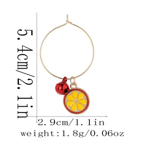 Detail showing dimensions of a fruit pendant earring with red bell and yellow flower