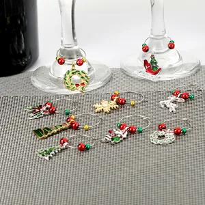 Detailed view of Christmas wine glass charms with festive alloy charms and colorful beads