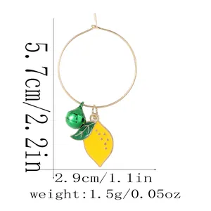 Detailed dimensions of gold hoop earring with lemon pendant and green bell charm