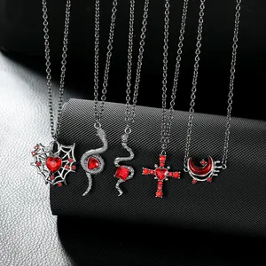 Gothic pendant necklace set featuring retro snake and spider web designs in dark metal