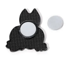 Detailed view of cat-shaped enamel pin back with magnetic clasp and dotted metal texture
