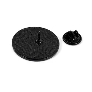 Black round metal badge back with dot texture pin and matching butterfly clutch buckle