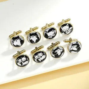 Close-up of eight round gold-plated cufflinks featuring various cute cartoon cat patterns
