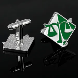 Silver cufflinks with green justice scale design on white enamel in business style