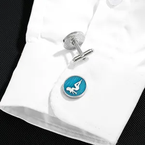 Mens round silver cufflinks with blue enamel sports silhouette on white shirt cuff