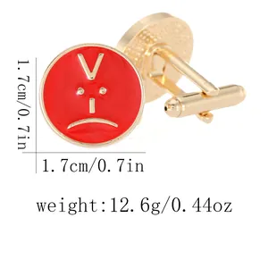 Polished gold-tone round cufflinks with red enamel smiley face and swivel back closure