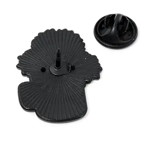 Matte black metal flower brooch backplate with butterfly clutch and radial texture