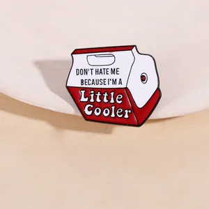 Detailed close-up of a red and white cooler-shaped enamel pin with humorous slogan