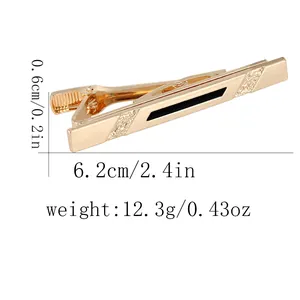 Detailed view of golden tie clip showing 6.2cm length and black decorative strip