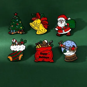 Lot de six broches de Noël en émail comprenant le Père Noël et un sapin festif