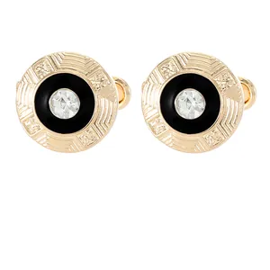 Classic round gold cufflinks with black enamel and sparkling crystal center for men