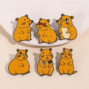 Close-up of 6 cute yellow capybara enamel pins with creative cartoon designs and vibrant colors