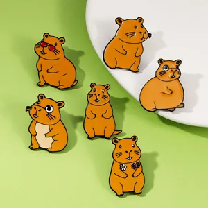 Set of six cute capybara enamel pins featuring varied poses and colorful accessories