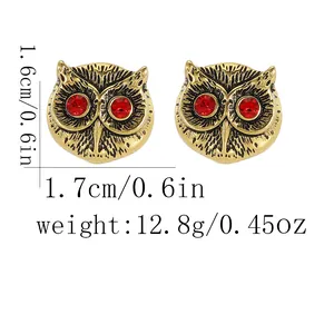 Gold owl cufflinks with red gemstone eyes and precise dimensions 1.6cm by 1.7cm