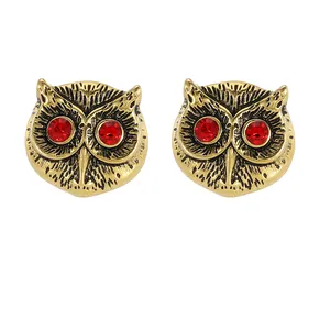 Retro golden owl cufflinks with red crystal eyes and detailed feather engraving design