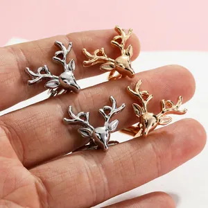 Close-up of vintage stag head cufflinks in gold and silver finish for men shirts