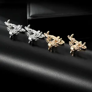 Detail of silver and gold stag head cufflinks for men's formal suit accessories
