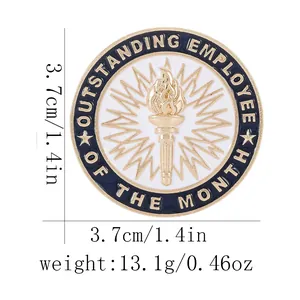 Detailed view of the 1.4 inch gold torch employee award pin with blue enamel trim