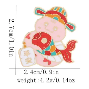 Detail view of pink enamel snake brooch with Ping An charm showing size 2.7cm and weight