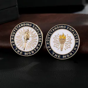 Macro detail of enamel lapel pins with gold engraving for outstanding employee recognition