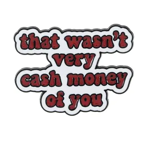 Enamel pin with 'that wasn't very cash money of you' quote on white background