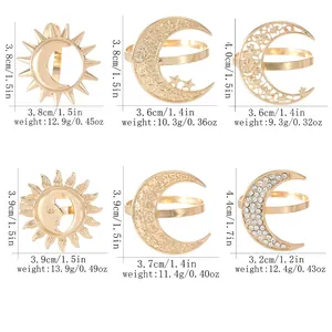 Golden sun and moon napkin rings set with detailed dimensions and metal relief design