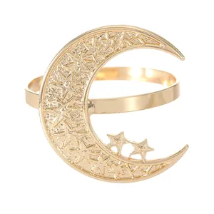 Golden metal crescent moon and star napkin ring holder for Middle Eastern festive decor