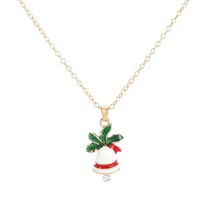 Christmas gold chain necklace with a festive white bell pendant and holly leaf charms