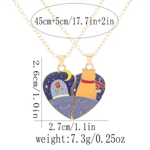 Detail of magnetic heart puzzle necklace featuring a cat, rose, and moon with dimensions