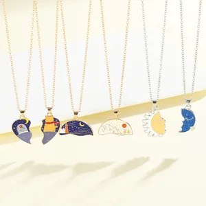 Detailed set of enamel necklaces with starry sky, cat, and landscape pendants in gold and silver