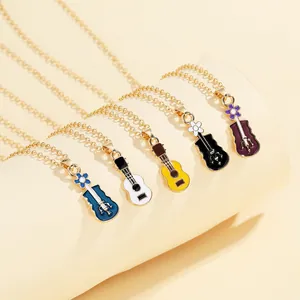 Detailed macro view of colorful musical instrument pendants with enamel floral patterns