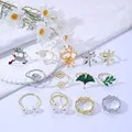 Lot de 12 ronds de serviette de Noël avec motifs renne et feuilles en or et en argent