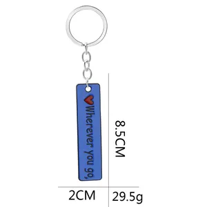 Blue rectangular keychain with 'Wherever you go' quote, heart icon and silver ring