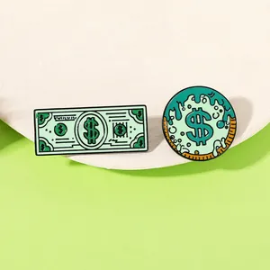 Macro shot of green enamel pins featuring a banknote and melting dollar sign art