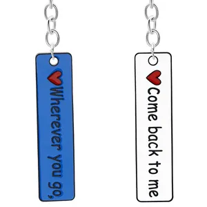 Couples keychain set with blue and white long bar pendants and romantic heart engraving