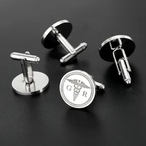 Silberne Edelstahl-Manschettenknöpfe mit Medizin-Symbol und G R Gravur für Herrenanzüge