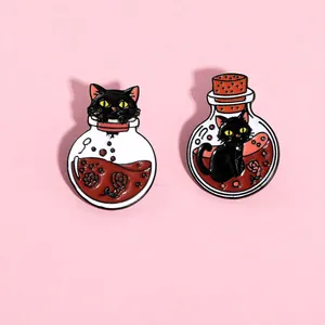 Detail of creative black cat enamel pins inside magic potion bottles with rose patterns