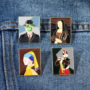 Set of four geometric enamel pins featuring classic world paintings on blue denim fabric