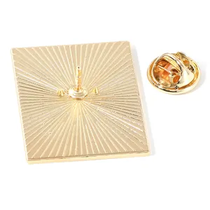 Vintage art badge in gold metal finish featuring back view with pin and butterfly clutch