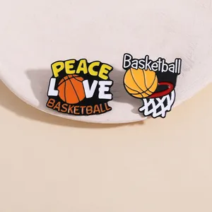 Detailed view of basketball enamel pin set featuring peace love basketball and hoop designs