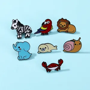 Set of seven colorful cartoon animal enamel pins featuring zebra lion and elephant designs