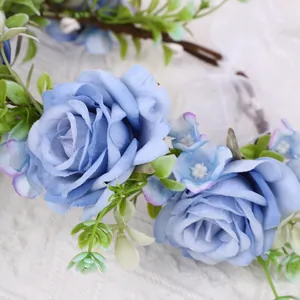 Bohemian light blue fabric rose flower crown with green leaves and white tulle ribbon