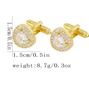 Detailed view of pear-shaped cufflinks with clear crystals and dimensions in centimeters