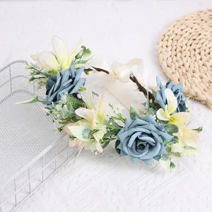 Floral wreath hair garland with blue roses, cream lilies and ribbons for bridal wedding hair