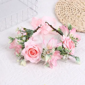Pink artificial rose floral headband with green leaves and ribbon for bridal wedding hair