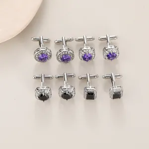 Detailed macro view of four pairs of elegant men's cufflinks with blue and black zircon stones