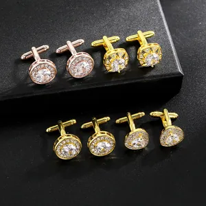 Macro shot of assorted round and square cufflinks with blue stones on black texture