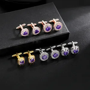 Detail of luxury round and square cufflinks with blue and purple zircon in silver and gold